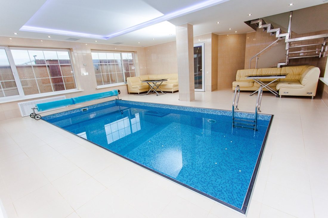 Indoor pool with tiled floor